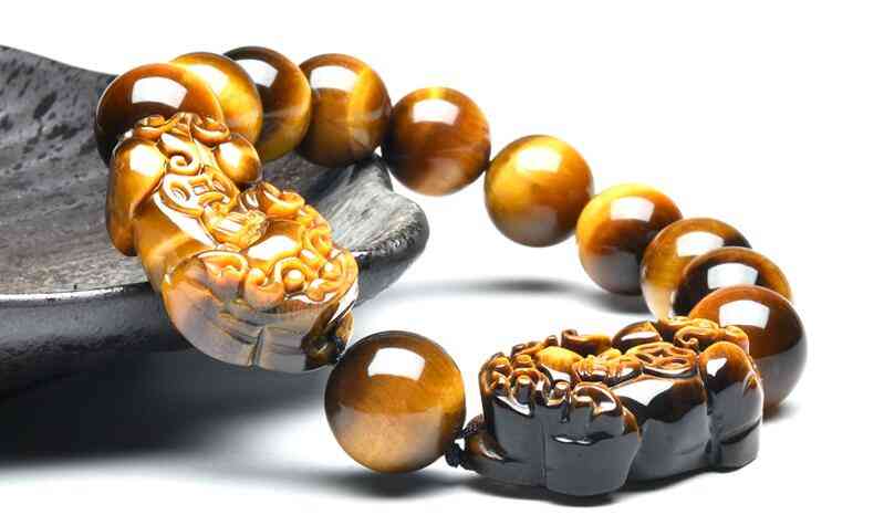 黃虎眼石的功效與作用(黃虎眼石的功效與作用禁忌)