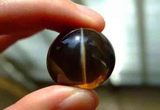 白貓眼石貴嗎(貓眼石怎么看真假辨別)插圖2