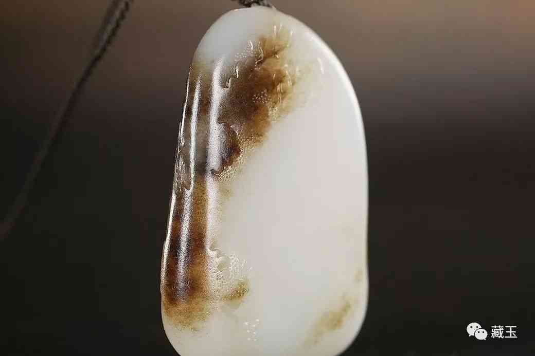 黑皮和田玉籽料原石(黑皮和田玉籽料原石鑲嵌吊墜)插圖5