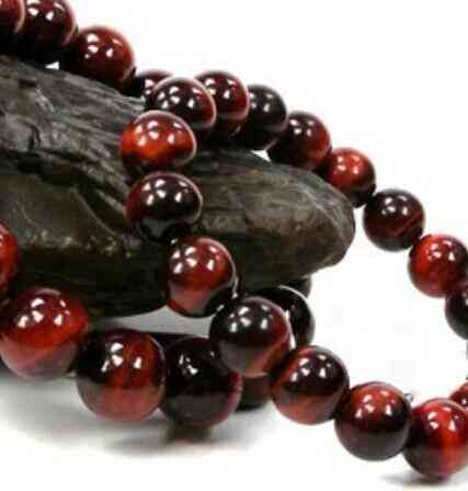 金虎眼石的功效與作用(金虎眼石的功效與作用佩戴禁忌)