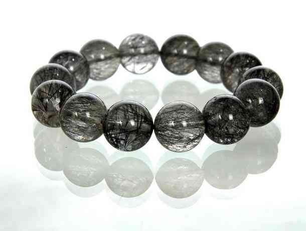 黑發(fā)晶手鏈功效與作用點(diǎn)(黑發(fā)晶手鏈的功效與作用)