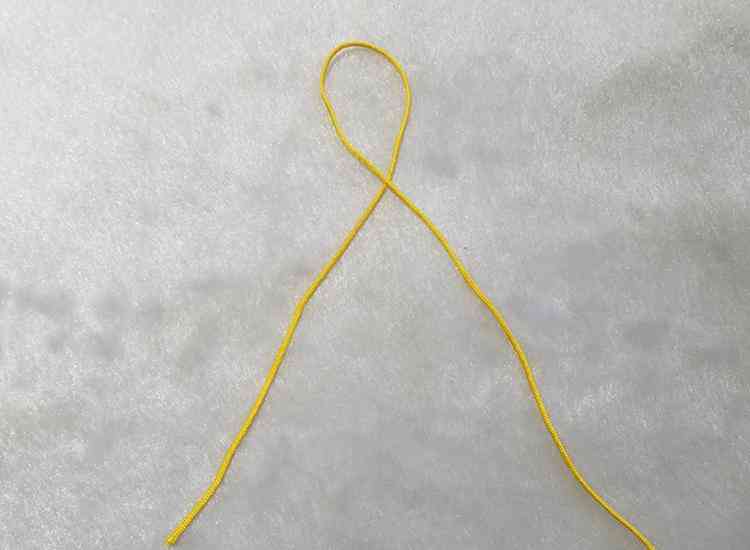 佛頭三通收尾打結(jié)方法(三通手串穿繩方法圖解)插圖2