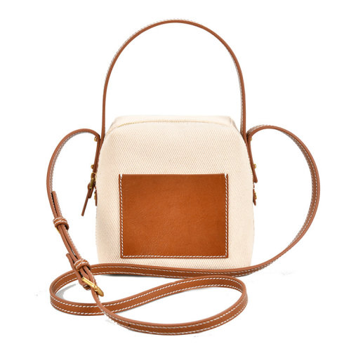 GeleiStory/GeleiStory  牛皮手提斜跨帆布包2021新款時(shí)尚包包女簡(jiǎn)約大氣手提包