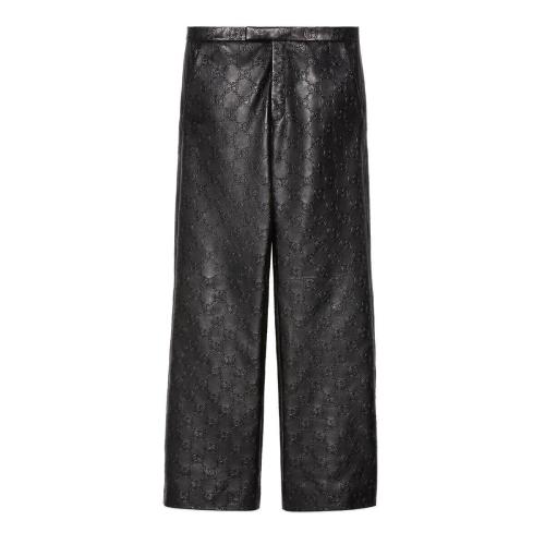  GUCCI古馳 22年秋冬 男士 GG皮革長褲 669071 XNAPN 1000