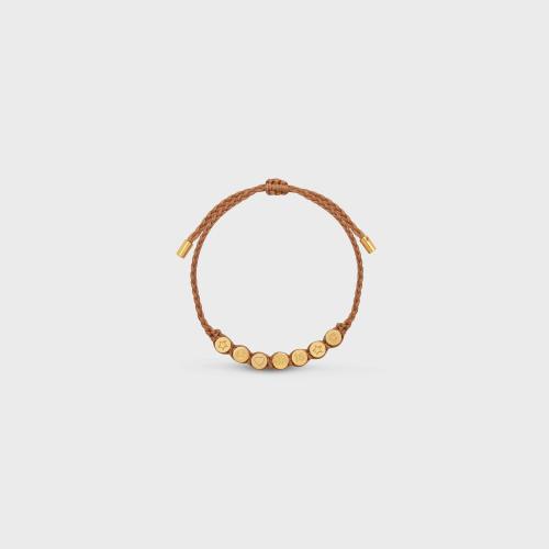  CELINE賽琳思琳 22年秋冬 女士 手鐲 CELINE PLAGE金色飾面黃銅和聚酯纖維波點(diǎn)手鐲 46Z932BPO.