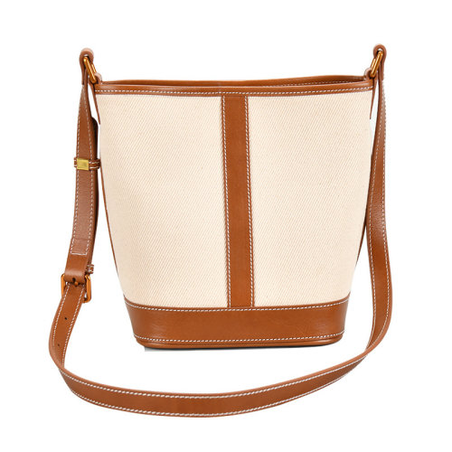 GeleiStory/GeleiStory  簡(jiǎn)約水桶包百搭單肩包包2021新款牛皮大容量水桶包ins熱賣女包