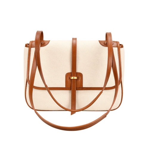 GeleiStory/GeleiStory   優(yōu)質(zhì)牛皮拼接大容量托特包2021新款帆布單肩腋下包小方包