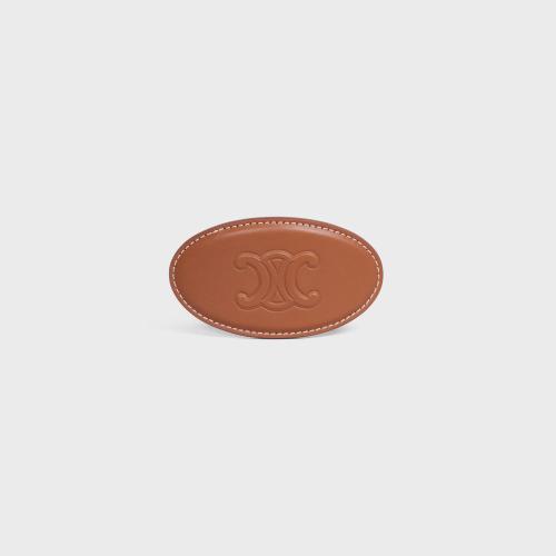  CELINE賽琳思琳 22年秋冬 女士 發(fā)夾 TRIOMPHE牛皮革和鐵合金發(fā)夾 460CX3SCF.04GT